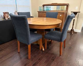 A3 - $95. Solid Wood Pedestal Table. Measures 45" round x 31" tall. A4 - $100 set of 4 blue dining chairs. 