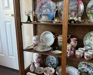 A9 - $275. Antique Cabinet with glass front and sides. Measures 40" wide x 15.75" deep x 58.75" tall. Excellent condition. 