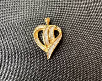 J19- $125. Necklace pendant.  3.5 grams 10kt & diamond. 