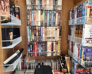 Large collection of VHS, DVD's, Cassette Tapes.