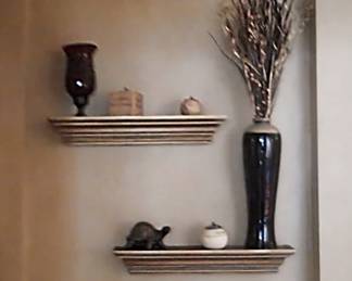 Short gold floating shelves.  Total of 4 of them.  