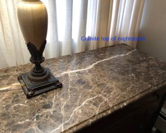 Granite top on 4 drawer Pennsylvania House nightstands.
