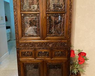 Deep carved 2-piece Asian cabinet on stand