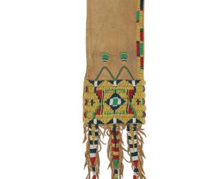 123
A Sioux Beaded Hide Tobacco Bag
Late 19th century; Northern/Central Plains
A soft brain-tanned hide bag with sinew-stitched beads in various colors yellow, blue, red, white and green, with three elongated triangular beaded hide tabs finished with self- fringe and metal cones
Bag: 14" H x 5.5" W; tabs: 7.25" L
Estimate: $1,200 - $1,800