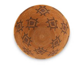 32
A Polychrome Yokuts Basket
Early 20th century; Central California
A coiled tall bowl with a tapering cylindrical form and multiple floating geometric motifs, with rim ticking
4.5" H x 8.5" Dia.
Estimate: $700 - $900