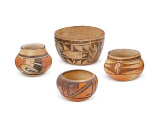 319
Four Hopi Pueblo Polychrome Pottery Vessels
Early/mid-20th century; Arizona
One signed to underside: Made by Te-Wanq-i-nema
The yellowware group consisting two olla-form jars and two bowls, 4 pieces
Largest: 3.875" H x 6" Dia.; smallest: 2.75" H x 4.25" Dia.
Estimate: $300 - $500