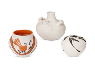 351
Three Acoma Pueblo Pottery Vessels
Three works:

Santana Antonio (b. 1915, Acoma Pueblo)
A polychrome olla jar, late 20th century
Signed to underside: Acoma N.M. / S. Antonio
The three-color jar with chicken and floral motifs on white slip
4.5" H x 5.25" Dia.

Vivian Seymour (b. 20th century, Acoma Pueblo)
A black on white seed pot, late 20th century
Signed to underside: V Seymour / Acoma, NM
The pot with black spiraled step motif of white slip
3.75" H x 4.75" Dia.

Jackie Shutiva Histia (b. 1961, Acoma Pueblo)
A white corn jar, early 21st century
Incised to underside: Histia Shutiva / Acoma N.M.
The speckled white jar with high relief ear of corn and opposed twisted handles
6.125" H x 6.5" Dia.

3 pieces
Estimate: $200 - $400