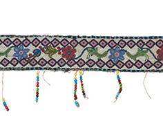 135
A Woodlands Beaded Bag Strap/Sash
Late 19th century; Northeastern United States
Designed with polychrome beads in floral, foliate and geometric motifs worked on cloth, with a purple silk backing/lining, added glass bead drops, and with hide additions to each end for securing as a sash
4.5" H x 45" W
Estimate: $500 - $700