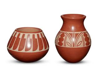 328
Two San Ildefonso Pueblo Pottery Vessels
Two works:

Albert and Josephine Vigil (1927-2009 and 1927-2001, San Ildefonso Pueblo)
A San Ildefonso redware pottery jar, late 20th/21st century
Signed to base: Albert & Josephine / San Ildefonso Pue
A shouldered small bowl with banded buff feather motif
4.25" H x 5.25" Dia.

Doug and Charlotte Vigil (each b. 1954; San Ildefonso Pueblo)
A San Ildefonso redware pottery jar, late 20th century
Signed to base: Doug Charlotte Vigil / San Ildefonso Pue
A vase form jar with a band of buff curvilinear motifs
6.75" H x 5" Dia.

2 pieces
Estimate: $200 - $300