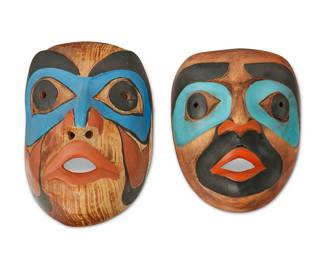 71
Two Northwest Coast Polychrome Masks
20th century; Pacific Northwest Coast
Each carved wood mask with vibrant painted features, 2 pieces
Larger: 9.75" H x 6.75" W x 4.75" D; smaller: 8.875" H x 6.75" W x 4" D
Estimate: $400 - $600