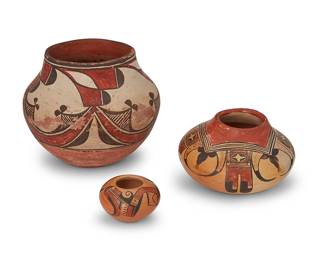179
Three Puebloan Polychrome Pottery Vessels
Three works:

A Zia Pueblo polychrome pottery jar, early 20th century
The polychrome jar with curved and geometric motifs and a secondary red band on base, with puki indentation
5.325" H x 6.5" Dia.

A Nampeyo-style polychrome yellowware seed jar, early 20th century
Appears unmarked
Attributed to Fannie Nampeyo by repute, the three-color wide-shoulder pot with eagle tail motif
3.325" H x 5.25" Dia.

Priscilla Namingha Nampeyo (1924-2008, Hopi-Tewa)
A diminutive polychrome yellowware jar, late 20th century
Signed to underside: Priscilla N. Nampeyo
The three-color jar with geometric motif
1.75" H x 2.625" Dia.

3 pieces
Estimate: $500 - $700