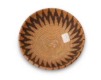 35
A Washoe Basketry Bowl
Early/mid-20th century; Great Basin
A coiled low bowl with a wide sawtooth zigzag band around bowl
2.75" H x 6.75" Dia.
Estimate: $500 - $700