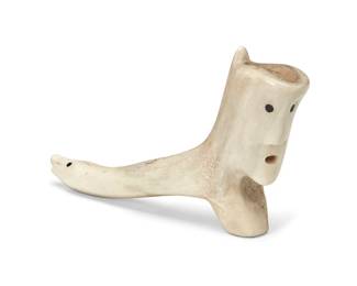 96
An Inuit Carved Antler
20th century
Appears unmarked
Possibly a cane handle, with carved human face to one side and carved animal face to the other, each with pigmented eyes
3.325" H x 6" W x 1.75" D
Estimate: $200 - $400