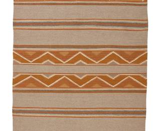 248
Mabel White (B.1921, Diné; Pine Springs)
A Navajo Wide Ruins rug
Woven in light grey, cream, gold, dark grey, and ochre wool with alternating striped and geometric banding
54" H x 35" W approximately
Estimate: $300 - $500
