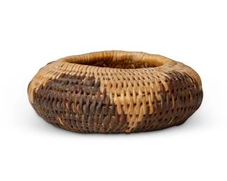 37
A Miniature Pomo Basket
Early 20th century; Northern California
A coiled diminutive globular bowl with four sawtooth motifs
0.625" H x 1.5" Dia.
Estimate: $200 - $300