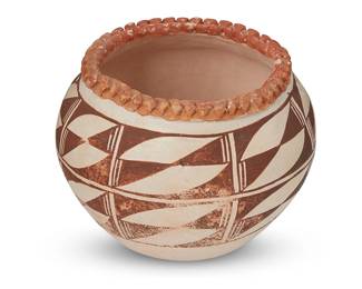 230
An Acoma Pueblo Polychrome Pottery Jar
Mid-20th century; New Mexico
Marked to underside: Acoma NM
The jar with two registers of geometric banding and a crimped red rim
4.75" H x 5.75" Dia.
Estimate: $200 - $300