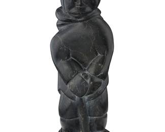 138
Elijassiapik
1912-1972, Inuit; Port Harrison/Inukjuak
Carved Figure Leaning On Pole
Stone
Signed syllabically to underside; further marked with artist's disc number: E9-915
12" H x 4.25" W x 3.325" D
Estimate: $300 - $500