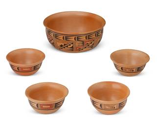 180
Ramona Ami (B. 1929, Hopi Pueblo)
A group of Hopi yellowware bowls, 1999
Large bowl marked: Hopi / Ramona Ami / 1999; each smaller bowl signed: Ramona
Comprising a large serving bowl (4" H x 9.5" Dia.) and four smaller soup bowls (2.5" H x 5.25" Dia.), each with red and black geometric motifs on yellow ground, 5 pieces
Estimate: $300 - $500