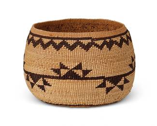 198
A Small Hupa/Yurok/Karuk Basket
Early/mid-20th century; Northern California
A diminutive twined basketry bowl with two bands of geometric imbricated motifs
2.875" H x 4" Dia.
Estimate: $300 - $500