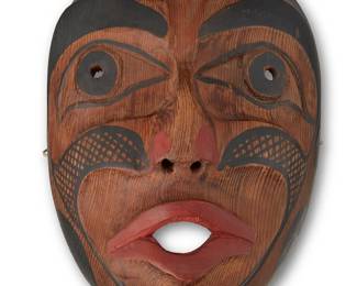 75
A Northwest Coast Mask
Mid-20th century; Pacific Northwest Coast
A large carved cedar wood mask with red and black painted features and accents
9.25" H x 7" W x 4.75" D
Estimate: $400 - $600