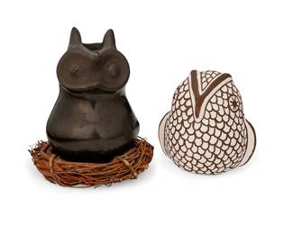 330
Two Puebloan Pottery Owls
Mid/late 20th century; Southwestern United States
One marked to underside: [rising sun] / Acoma Sky City / Virginia Lowden; one marked: Santa Clara
Comprising one Virginia Lowden (b. 1936, Acoma Pueblo) brown on white painted pottery owl and one burnished blackware owl set in a nest, 2 pieces
Blackware: 4" H x 2.5" W x 2.325" D; Lowden: 3" H x 3" W x 2.125" D
Estimate: $200 - $400