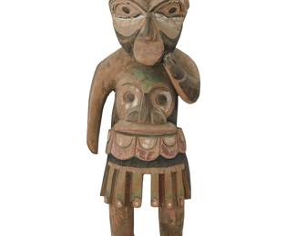 84
A Northwest Coast Polychrome Totem Figure
Early/mid-20th century; Pacific Northwest Coast
A carved wood shaman figure with multicolor painted details mounted on a wooden base
9.25" H x 3.75" H x 2.625" D
Estimate: $400 - $600