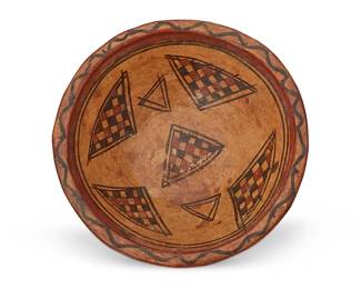 273
A Southwest Polychrome Pottery Bowl
Late 19th/early 20th century
Unmarked
The possibly Puebloan three-color varnished bowl with checkered triangle motifs
2.5" H x 7.5" Dia.
Estimate: $200 - $400