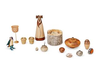 326
A Mixed Group Of Native American-Style Miniature Objects
20th century
Six marked for maker
A large varied group of diminutive items including a pierced carved wood cup (Sinner / SKS / O4), a Hopi pottery katsina figure, a Hopi wooden kiva ceremony tableau scene with tiny figures, four Puebloan miniature pottery jars in various styles (N. Simplicio, Zuni; AROY [feather]; Nona Naha), a silver jar with applied lizard motifs, two Pima/Tohono O'odham-style miniature white horsehair lidded baskets, a large painted pottery lidded jar, two miniature lidded baskets, and a basketry woven bird figure, 14 pieces total
Largest: 4.75" H x 2" Dia.; smallest: 0.625" H x 0.5" Dia.
Estimate: $200 - $400