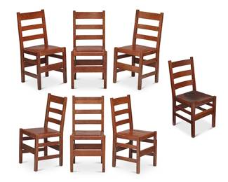 158
Circa 1901-1917
A Set Of L. & J.G. Stickley Side Chairs, No. 350
Each marked to verso: THE WORK OF L & JG STICKLEY; one marked with Stickley shop mark [joiner's compass]
Comprising six oak wood ladder back dining chairs with leather wrapped seat upholstery, sold together with one Gustav Stickley dining chair no. 1301 with leather wrapped seat upholstery and iron tacking, 7 pieces
Set of six: 35" H x 16.625" W x 18.75" D; solo chair: 36.5" H x 16.875" W x 20.25" D
Estimate: $1,000 - $1,500