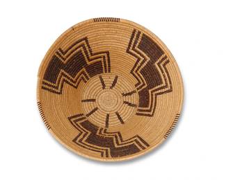 34
A Panamint Basketry Bowl
Early 20th century, Timbisha Shoshone; Eastern Central California
A small coiled flared bowl with three radiating stepped motifs and rim ticking
2.7" H x 7" Dia.
Estimate: $600 - $800