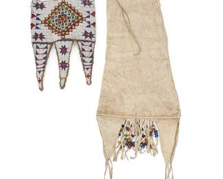 128
Two Sioux Beaded Hide Bags
Late 19th/early 20th century; Northern/Central Plains
Comprising two bags, including one likely a lower bag section fragment, fully beaded in blue and white on both sides, and with elongated triangular double-sided beaded tabs to lower edge (11.5" H x 7.5" W), and a long tapered plain hide bag with triangular hide tabs and fringe, with various glass trade beads (19.5" H x 9" W; tabs: 10.75" L), 2 pieces
Estimate: $700 - $900