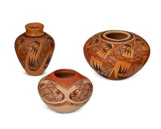 316
Miriam Nampeyo (B. 1956, Hopi-Tewa)
A group of polychrome pottery vessels, late 20th century
Each signed to underside: Miriam Nampeyo [corn stalk]
Comprising a yellowware seed pot, a high-shouldered yellowware jar, and a small low-shouldered jar, each with three-color migration motifs
3 pieces
Seed pot: 3.325" H x 5" Dia.; jar: 3.875" H x 3.125" Dia.
Estimate: $300 - $500
