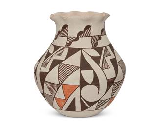 267
An Acoma Pueblo Polychrome Pottery Jar
Mid-20th century; New Mexico
Marked to underside: Acoma N.M.
The three-color vase with crimped rim and overall geometric and kiva step motifs on white slip
6.75" H x 6" Dia.
Estimate: $200 - $400