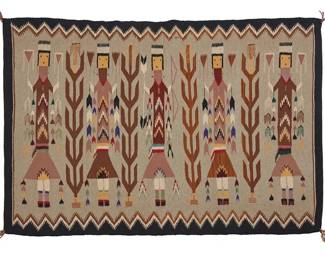 111
A Navajo Yei Pictorial Textile
Mid/late 20th century, Diné
Woven by Thelma Begay (b. 20th century, Diné) in grey, brown, cream, and multicolored wool depicting five standing Yei figures alternating with corn stalks, with an elaborate zigzag sawtooth border
31" H x 47" W
Estimate: $800 - $1,200