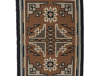 164
A Navajo Two Grey Hills Textile
Mid-20th century, Diné
Woven in black, grey, cream, and brown wool with central stepped motifs and stepped corners, with banded borders
48.5" H x 33.5" W
Estimate: $400 - $600