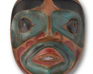 72
A Northwest Coast Polychrome Mask
Early/mid-20th century; Pacific Northwest Coast
A carved cedar wood mask with vibrant green, red and black painted features and accents
9" H x 7" W x 3.75" D
Estimate: $500 - $700