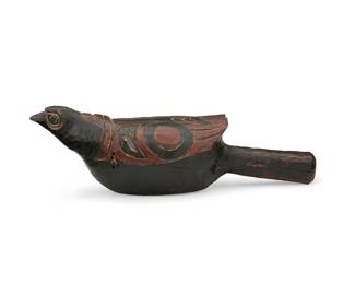 83
A Northwest Coast Polychrome Bird Rattle
Early 20th century; Pacific Northwest Coast
A polychrome stained carved wood rattle with painted bird features and stylized motifs to body and wings, and corded lashing to sides
3.75" H x 12" W x 4" D
Estimate: $500 - $700