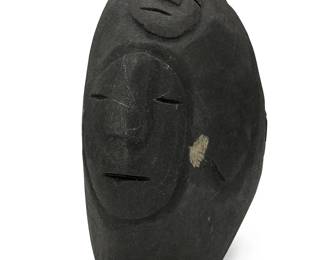 93
Lucy Tasseor Tutsweetok
1934-2012, Inuit; Eskimo Point/Arviat
Stone Faces
Carved stone
Signed syllabically to underside
6.125" H x 4.75" W x 2.75" D
Estimate: $800 - $1,200