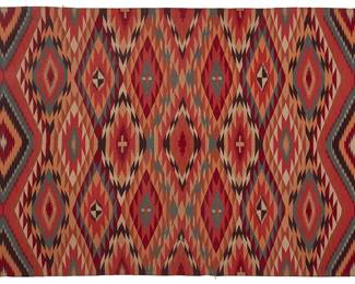 24
A Framed Navajo Germantown Eyedazzler Textile
Late 19th/early 20th century, Diné
Woven in multicolored wool in an all-over diamond motif with crosses, framed and mounted within a custom double-sided clear acrylic frame
60" H x 37" W approximately
Estimate: $3,000 - $5,000