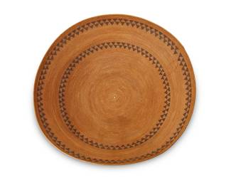 31
A Large Yokuts Basketry Bowl
Early 20th century; Central California
Coiled monumental bowl with two rows of triangular banded motifs
9.5" H x 30" Dia.
Estimate: $6,000 - $8,000