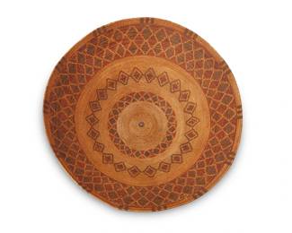 39
A Tübatulabal/Kawaiisu Polychrome Basket
Early/mid-20th century; Central California
A large coiled tapered finely stitched bowl with a heavy rattlesnake band and inner narrow garter snake band, with spaced vertical ticks to rim and a center silver button bead for hanging
5" H x 16" Dia.
Estimate: $3,000 - $5,000