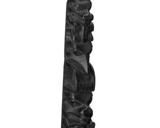79
A Haida Argillite Totem Carving
Early 20th century; Pacific Northwest Coast
Unmarked
The carved stone totem representing five figures including a bear, raven, wolf, and possibly marten or dog, with a human face at base, and with a concave carved backside
18.5" H x 4.25" W x 3.5" D
Estimate: $3,000 - $5,000