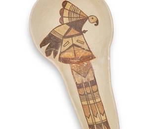 231
A Hopi Pueblo Polychrome Pottery Ladle
Early 20th century or earlier; Arizona
With a central polychrome Sikyatki-style parrot/avian motif
10" H x 4.125" W x 2" D
Estimate: $200 - $300