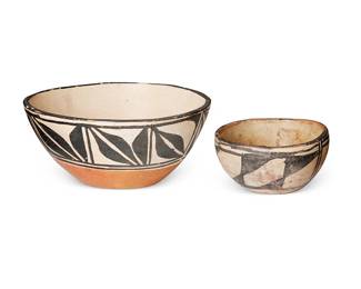215
Two Santo Domingo Pueblo Pottery Bowls
Early/mid-20th century; New Mexico
Each appears unmarked
Comprising a chili bowl with banded foliate motif above a terracotta wash and a smaller older bowl with black on white geometric banded motif, 2 pieces
Larger: 3.25" H x 7.25" Dia.; smaller: 2.25" H x 4.25" Dia.
Estimate: $300 - $500