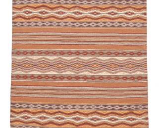 249
A Navajo Wide Ruins Textile
Late 20th century, Diné
A small rug woven in multiple colors including salmon, red, cream grey and purple wool with alternating bands of conjoined serrated diamonds and striped banding
35.25" H x 26" W
Estimate: $200 - $400