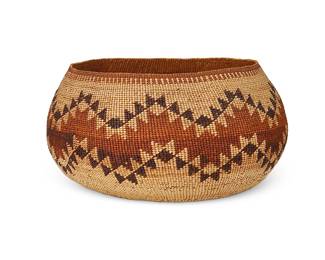 199
A Polychrome Hupa/Yurok/Karuk Basket
Early/mid-20th century; Northern California
A twined basketry bowl with imbricated zigzag sawtooth banding
4.75" H x 8.5" Dia.
Estimate: $500 - $700