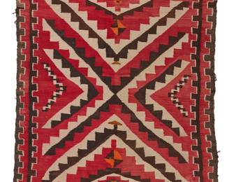 26
A Navajo Regional Rug
Late 19th/early 20th century, Diné
Woven in red, cream, dark brown, and orange wool with a large central stepped X motif and double stepped borders
53" H x 44" W
Estimate: $500 - $700