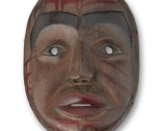 74
A Northwest Coast-Style Mask
Mid-20th century
A small carved wood mask with painted features and red curvilinear and geometric accents
6.875" H x 4.875" W x 2.5" D
Estimate: $400 - $600