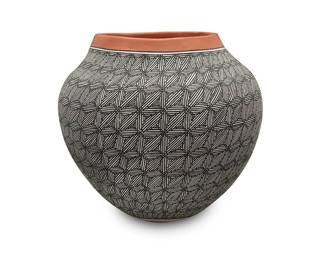 269
Santana Antonio And Irma Maldonado (B. 1915 And B. 1932, Acoma Pueblo)
A pottery olla jar, late 20th century
Signed to underside: Acoma N.M. / S. Antonio + I.R.M.
The black on white jar with fine-line geometric design and terracotta wash to the rim
9.25" H x 10.25" Dia.
Estimate: $200 - $400