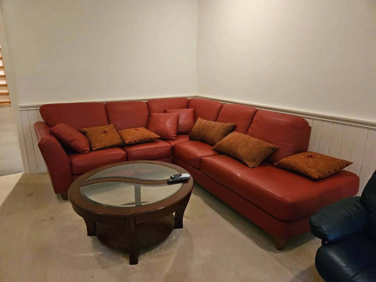 Jamar red leather sectional 8.5 x 7.5 like new $1500.00